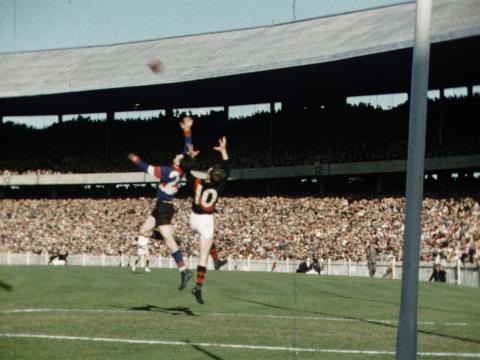 men playing an AFL match