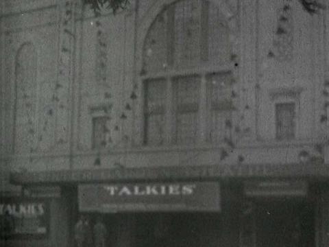 The Wintergarden Theatre in Sydney with a banner promoting 'talkies' - movies with sound - in 1929