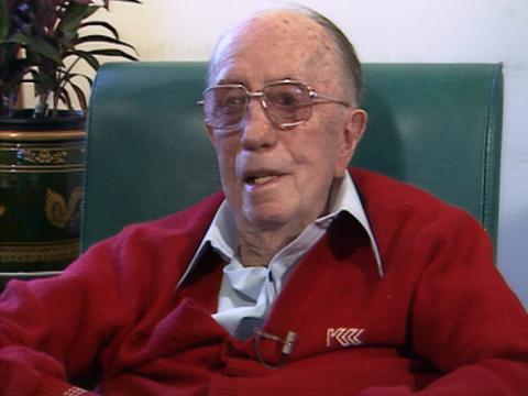 Singer and songwriter Jack O'Hagan sitting down in a chair.