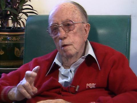 Singer and songwriter Jack O'Hagan sitting down in a chair.