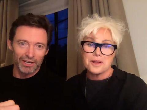 Hugh Jackman and Deborra-Lee Furness being interviewed over Zoom