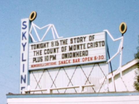 A 1960s sign for the Skyline Drive-in advertising the movies screening that night