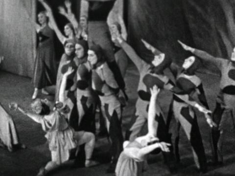 A group of dancers from the Ballets Russes du Monte Carlo perform on stage. Circa 1936.