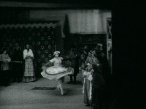 Ballet Russes dancer Helene Kirsova in a screenshot from a home movie of the ballet Petrouchka.