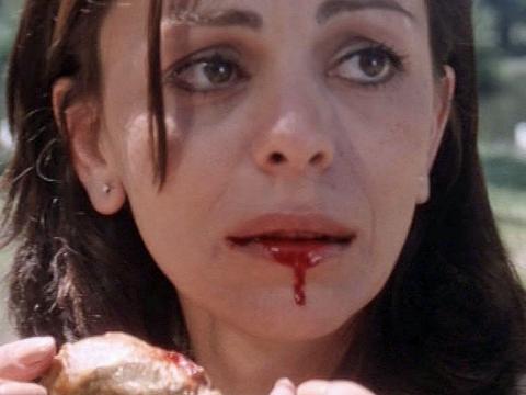 Kate Davis, played by Chantal Contouri, with blood dripping down her face