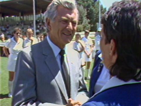 Prime Minister Bob Hawke greets a member of the England Women's cricket team in 1985 in Canberra.