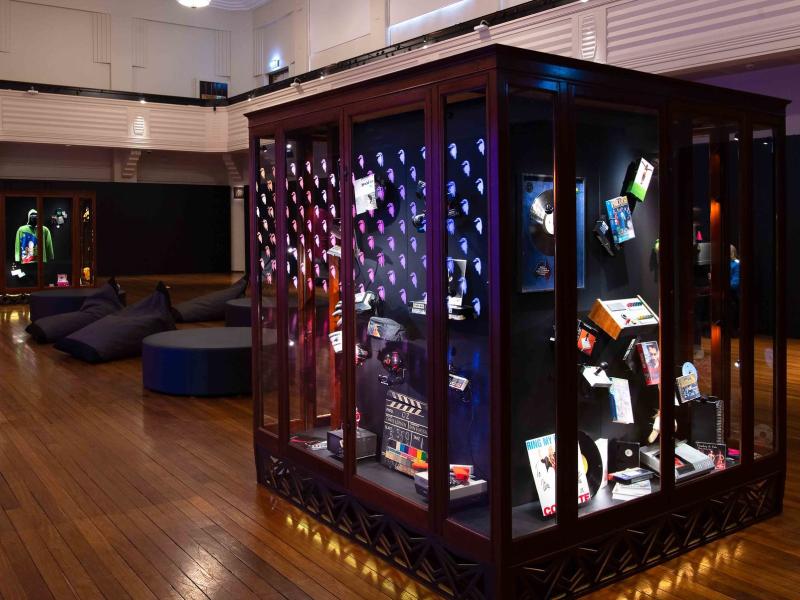Wooden display case in gallery space