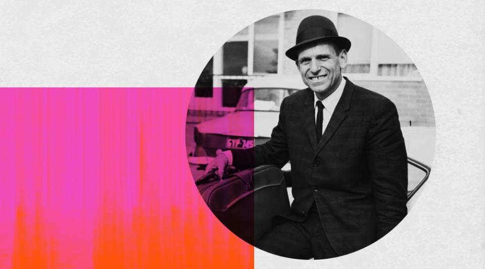 Australian actor Leonard Teale wearing a hat and suit and smiling at the camera