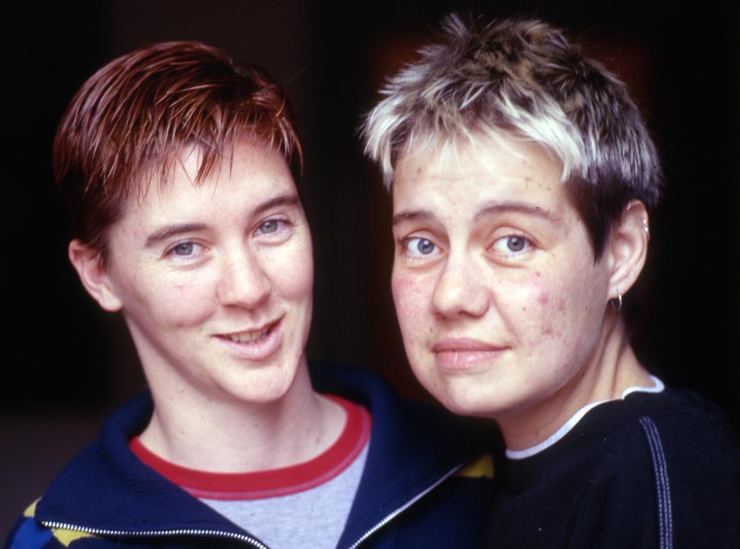 Head and shoulders shot of two women looking directly at camera.