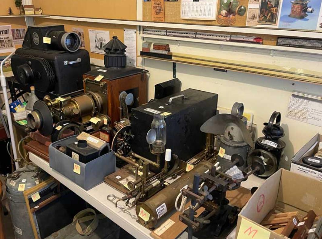 Old audio visual equipment laid out on a table.