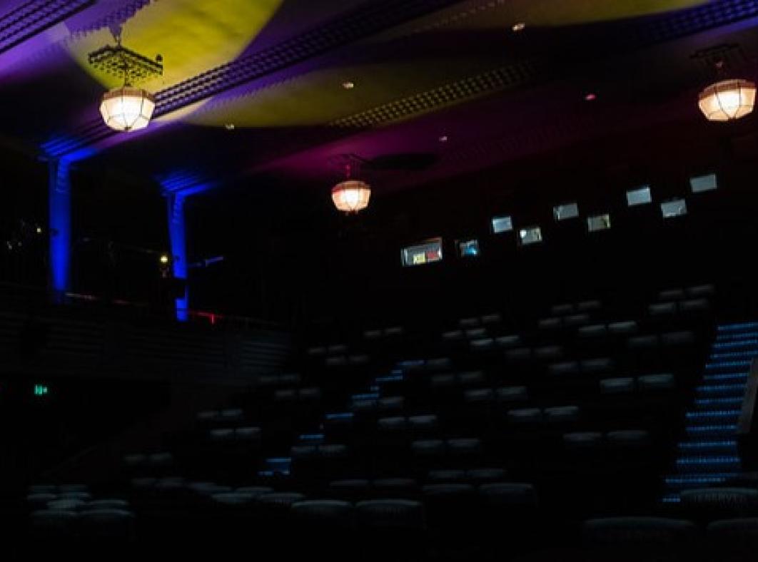 Empty cinema with coloured lighting on rooftop