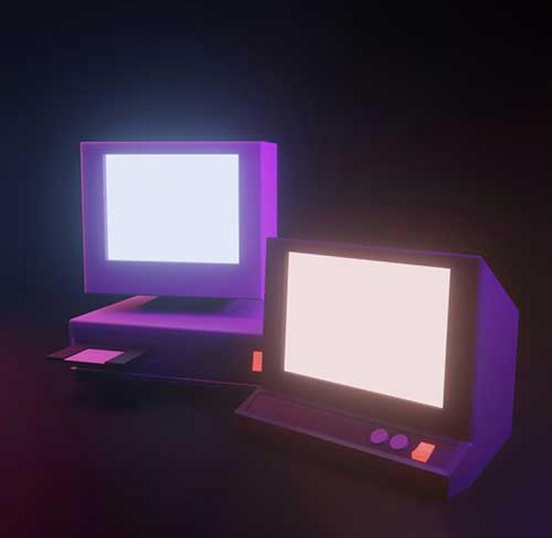 Two neon pink coloured computers from the 1990s.