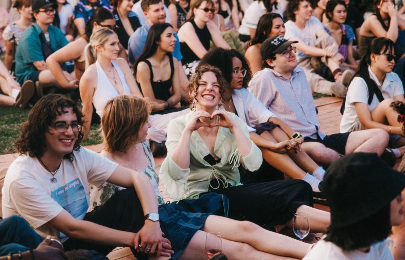 Crowd sitting and watching Nai Palm Live at the NFSA