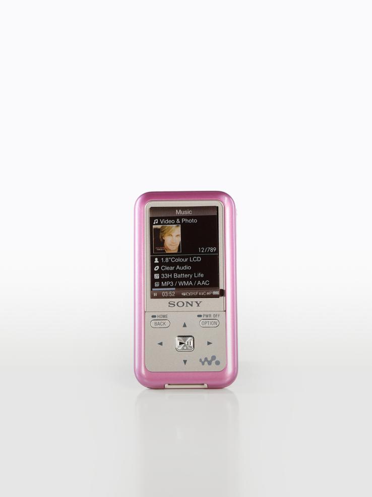 A Sony brand digital music player in a pink casing.
