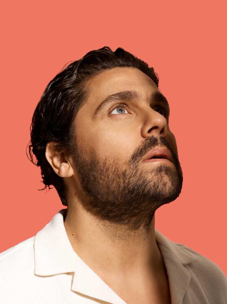 Album cover featuring a photo of musician Dan Sultan looking upwards.