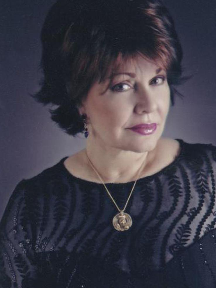 Singer Pilita Corrales wearing a gold pendant.