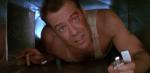Close up of a man crawling through a tunnel.