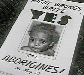 Image of a poster with an Aboriginal child on it which reads 'Right wrongs write YES for Aborigines'