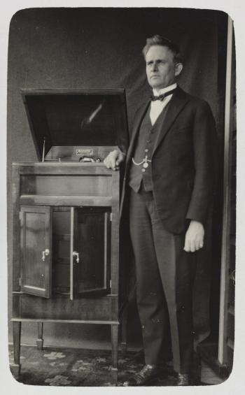 Stuart Booty standing next to his Vitavox Gramophone