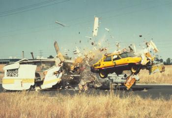 Car smashes through a caravan