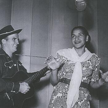 Black and white image of 50s jazz and blues singer Georgia Lee pictured with unknown guitarist