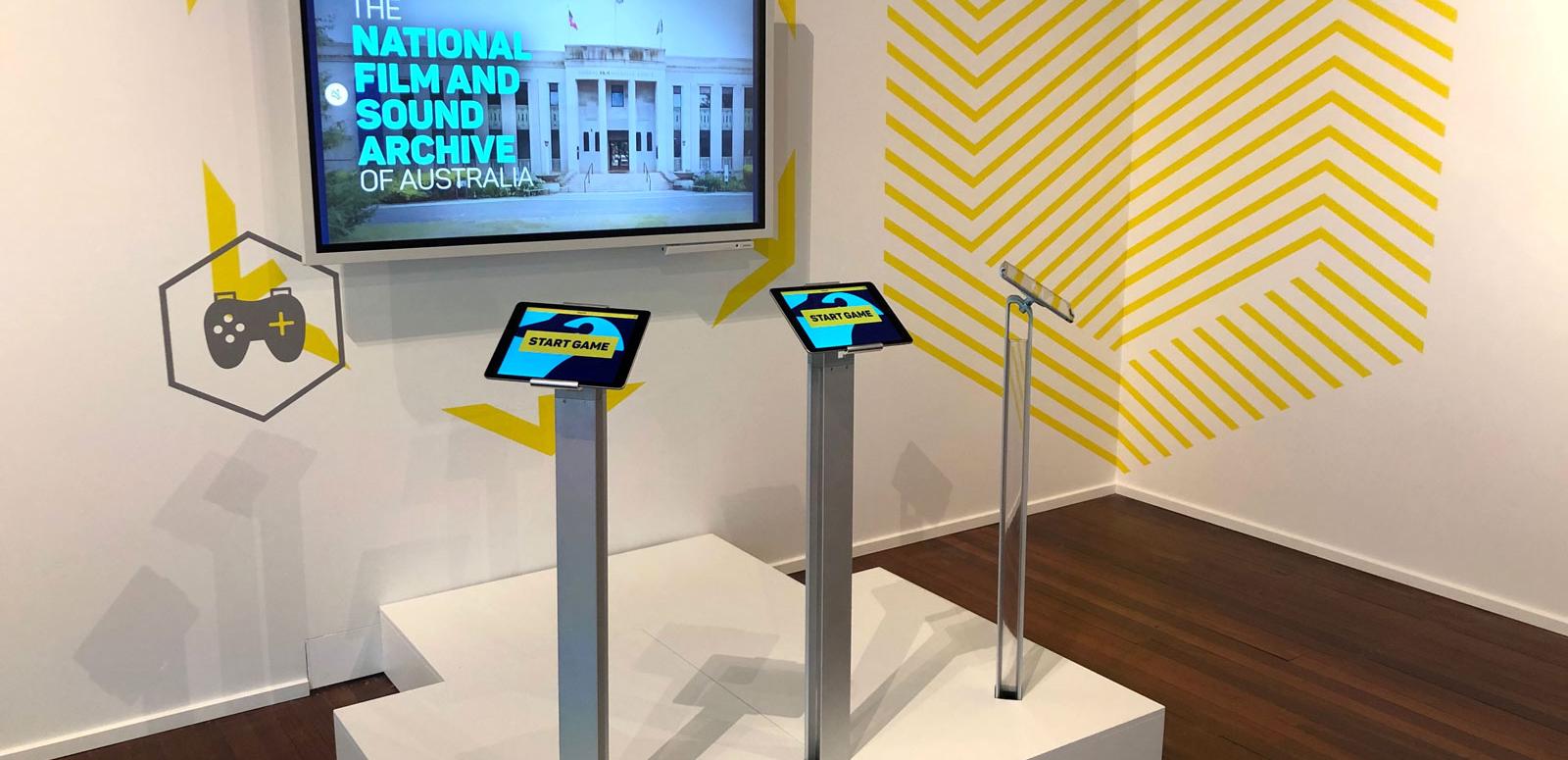 Hive - NFSA trivia game Hive interactive exhibition space with large screen and three Ipads.
