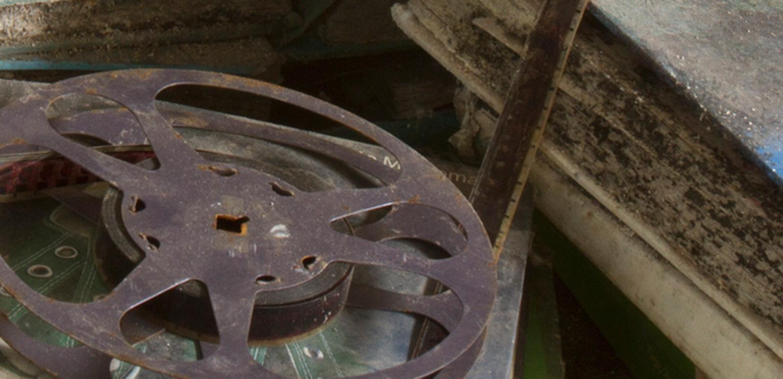 Film reel and book that have been damaged by water