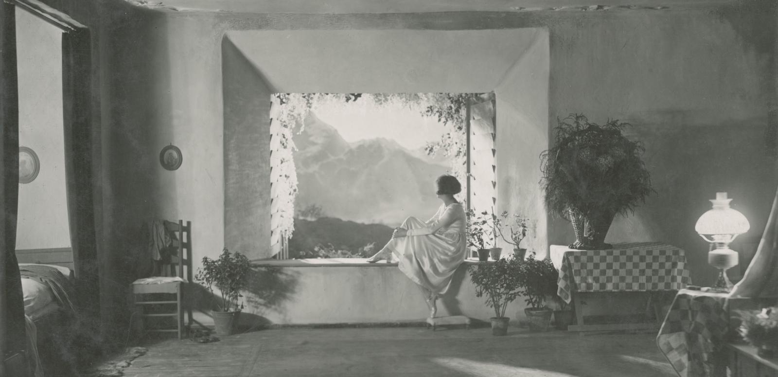 Leni Riefenstahl sits looking out the window in a still from the German film Der Heilige Berg, 1926. Leni Riefenstahl sits looking out the window in a still from the German film Der Heilige Berg, 1926.