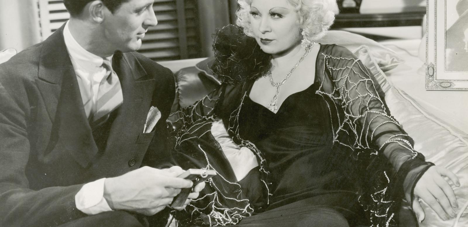 Cary Grant and Mae West exchange a look in a still from the film I'm No Angel, 1933. Cary Grant and Mae West exchange a look in a still from the film I'm No Angel, 1933.