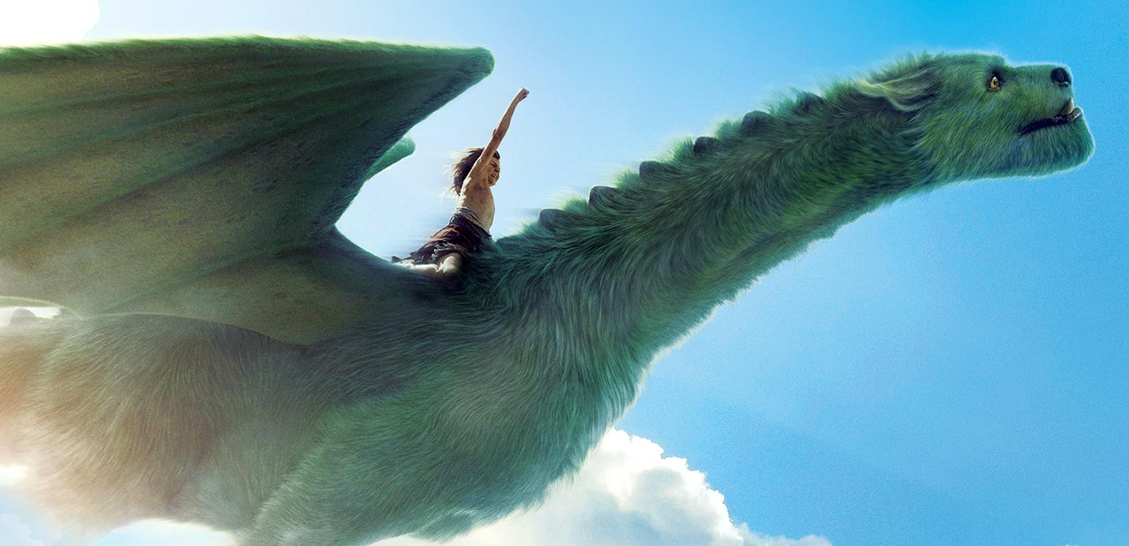 A young boy riding on the back of a flying dragon with one arm raised toward the sky