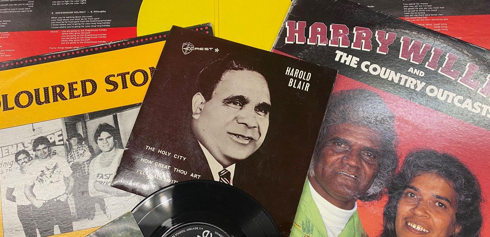 A collage of vinyl record covers including images of First Nations singers and bands.