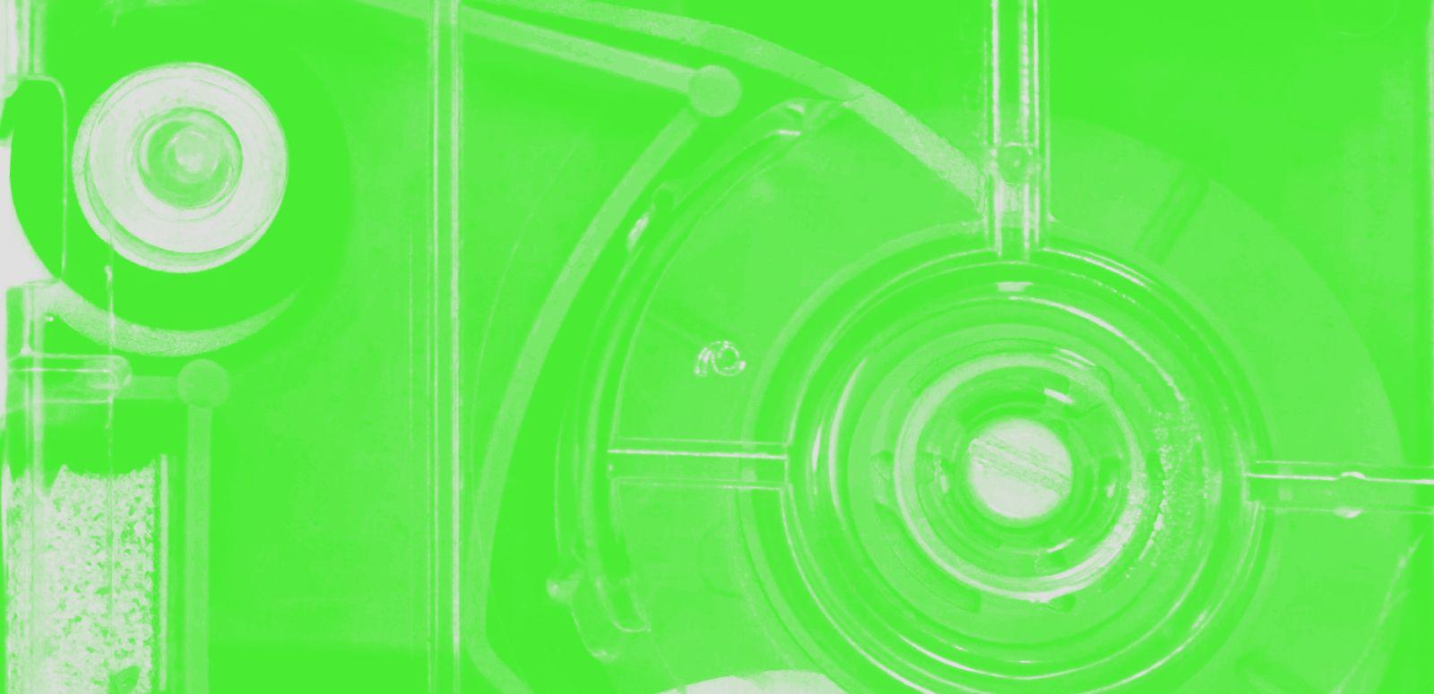 A stylised close-up of radio equipment tinted green