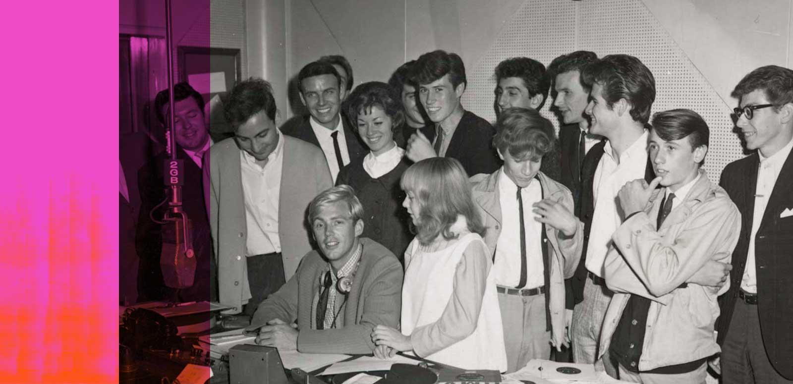 Ward Austin in the 2GB studios surrounded by musicians and singers, c1964.