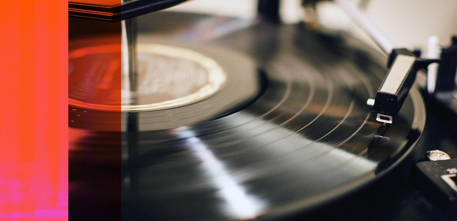 A vinyl record being played on a record player