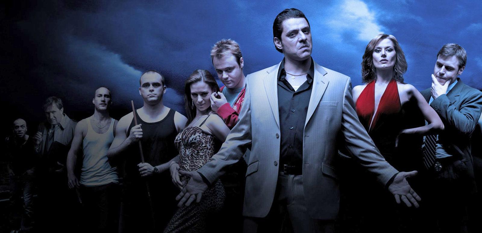 The cast of the TV Series Underbelly posing for the camera