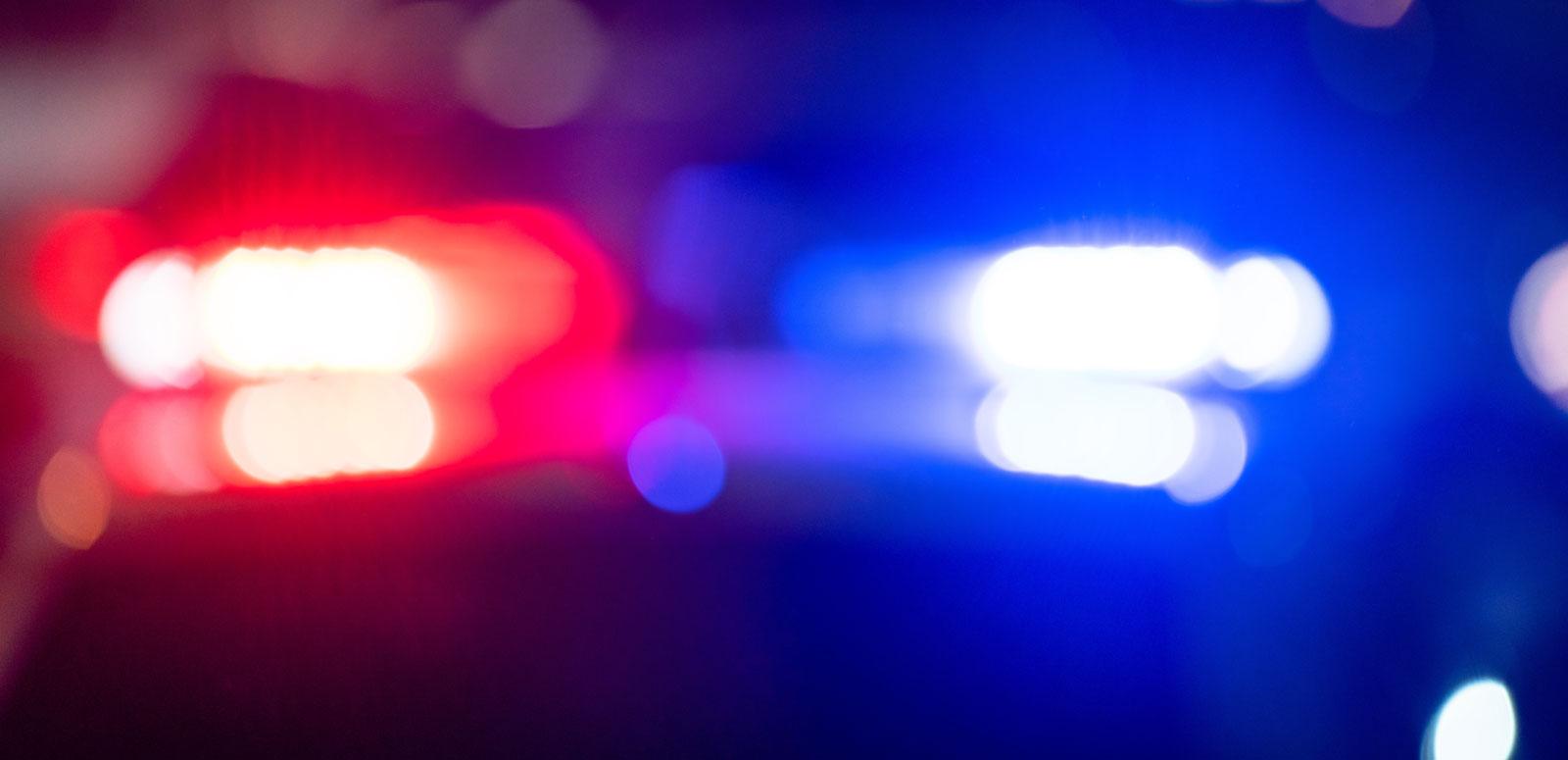Red and blue lights of a police car.
