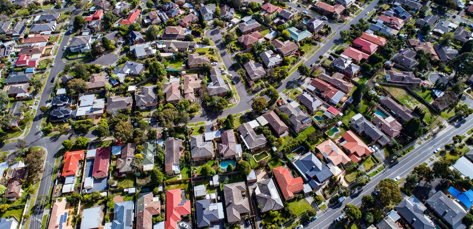 Aerial shot of houses in the outer suburbs of Melbourne.