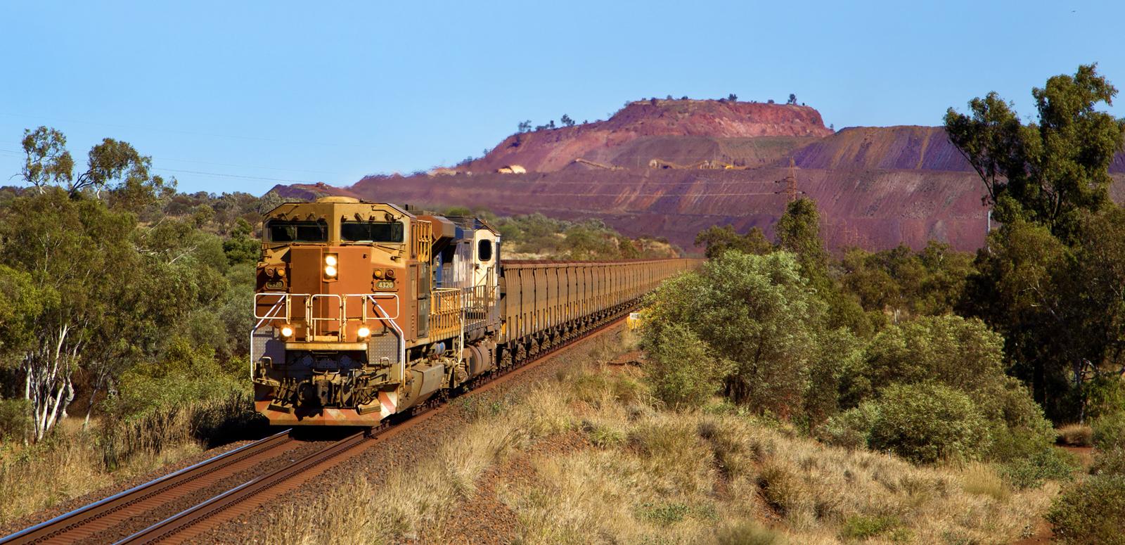 A loaded ore train leaving the Mount Whaleback mine site at Newman in Western Australia