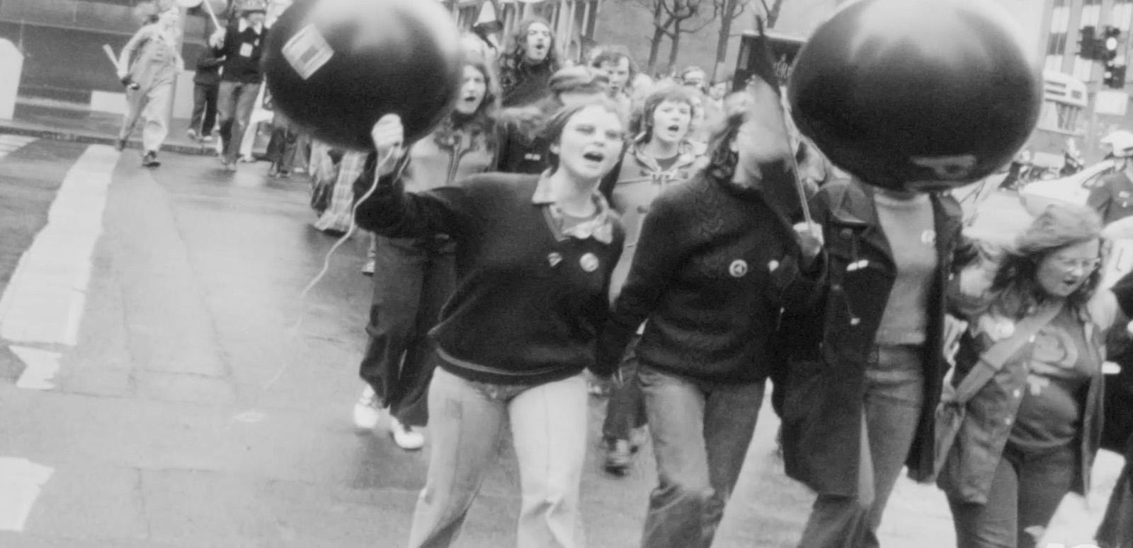 protest march, black and white image, 1973