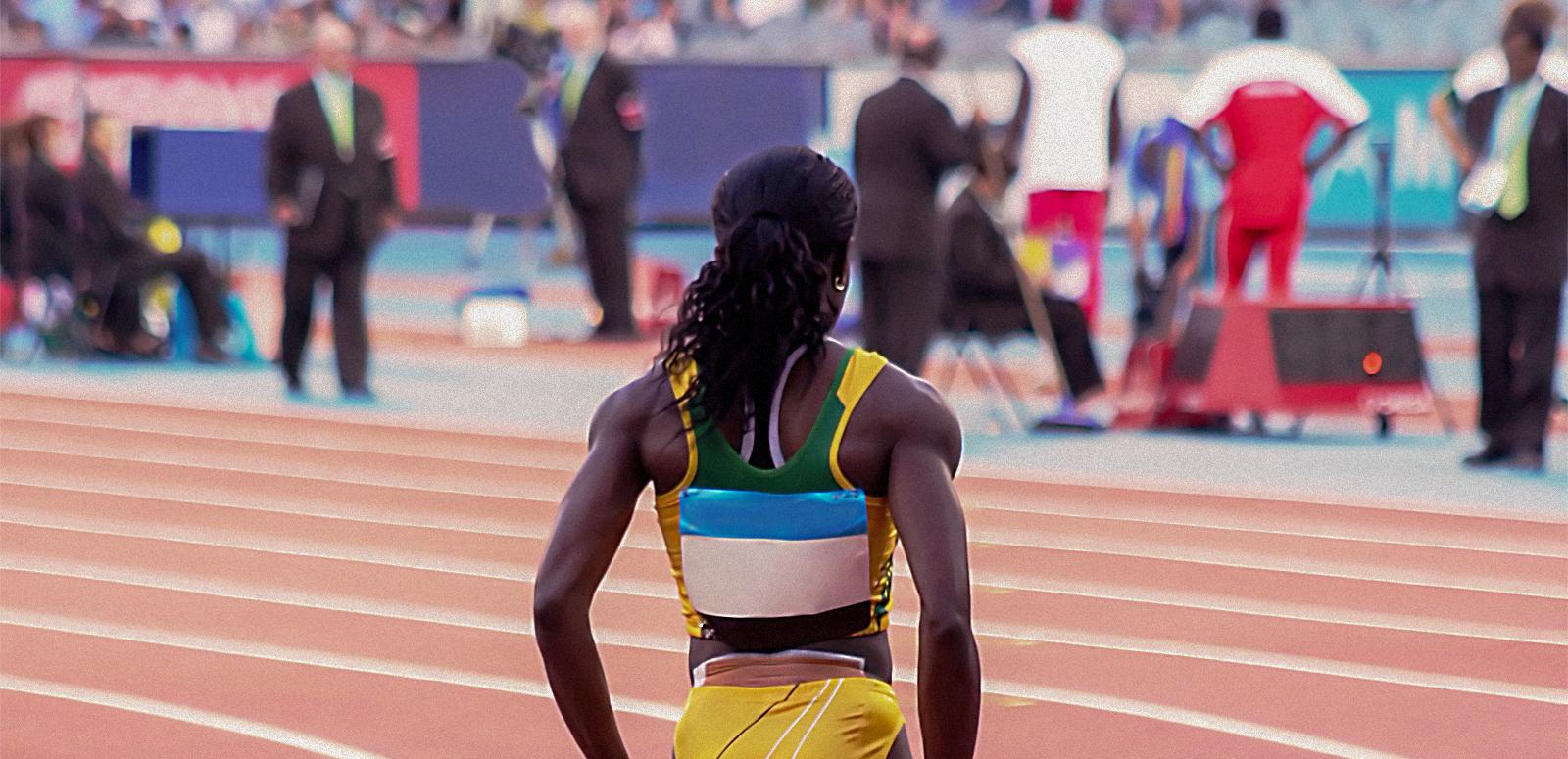 Commonwealth Games_back of athlete_1600x775 Back view of a female athlete standing on the running track.