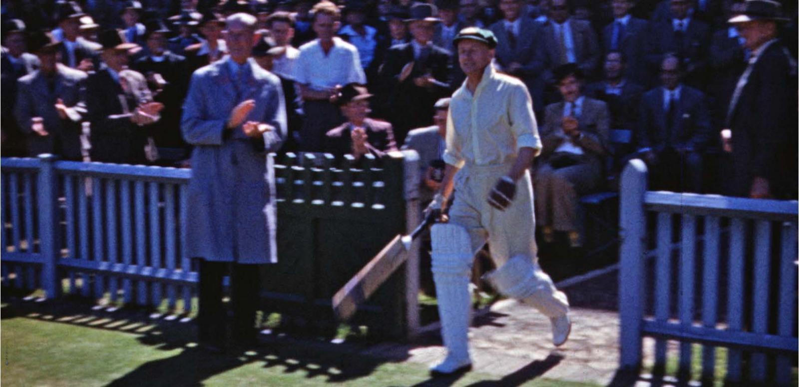 Cricketer Sir Donald Bradman walks onto the Sydney Cricket Ground ready to bat. Cricketer Sir Donald Bradman walks onto the Sydney Cricket Ground ready to bat.