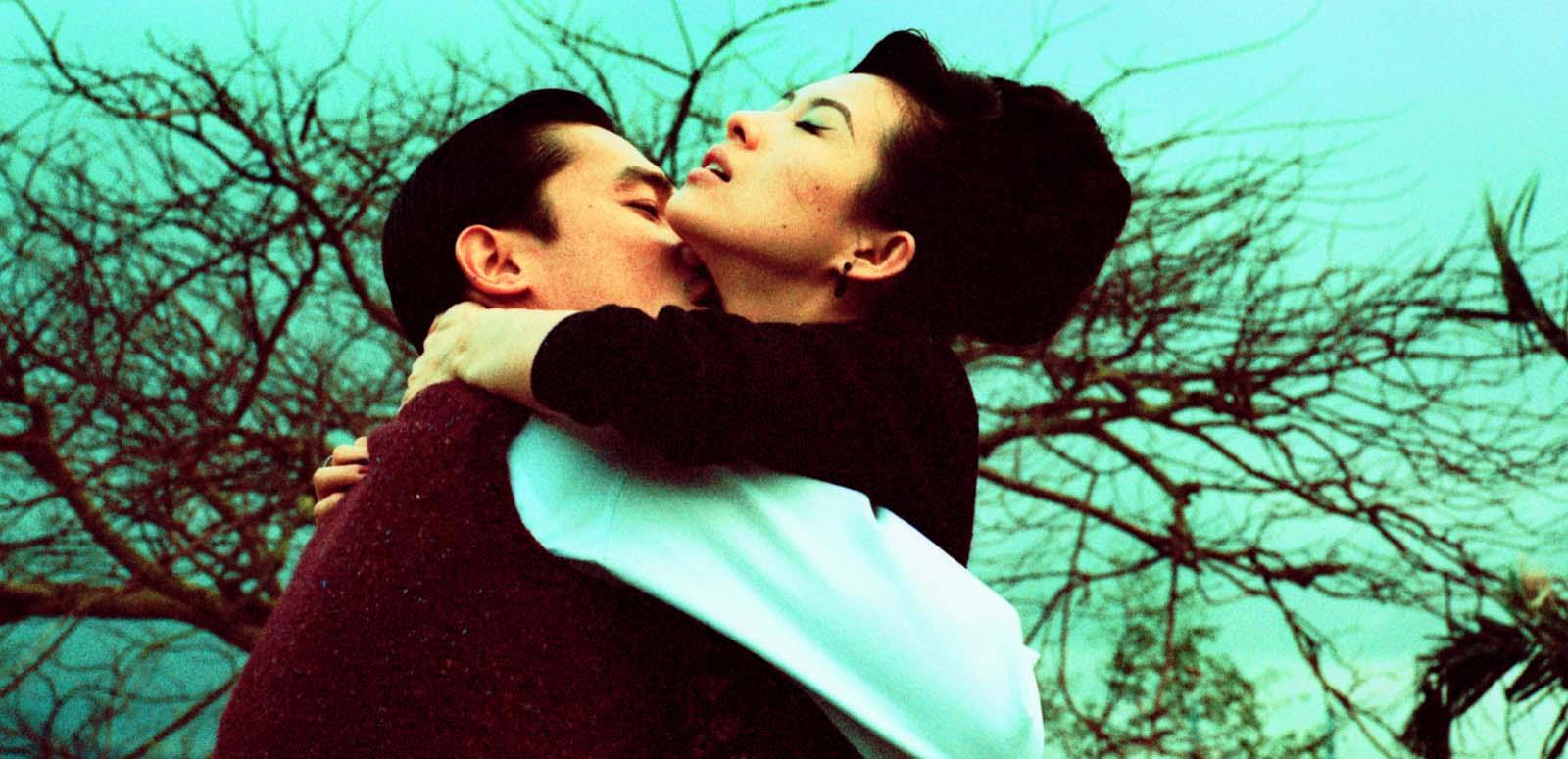 Tony Leung and Zhang Ziyi in passionate embrace