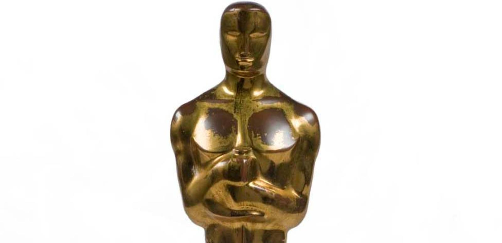 A gold Academy Award statue seen from the waist up, with a man clutching the handle of a sword