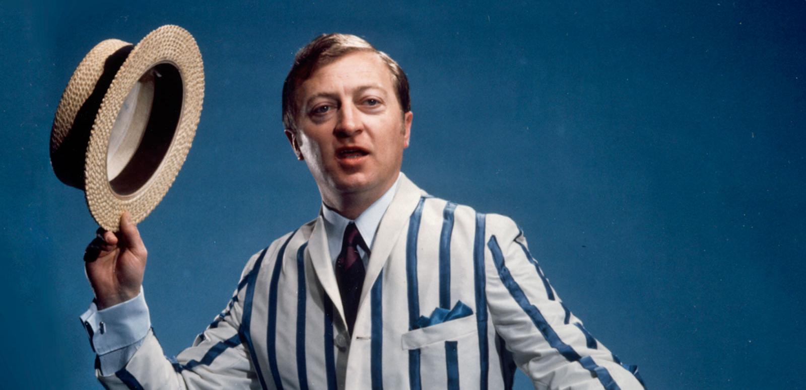 Graham Kennedy in striped jacket and straw hat Graham Kennedy wearing a striped jacket and holding a straw boater hat in a promo shot for GTV 9.