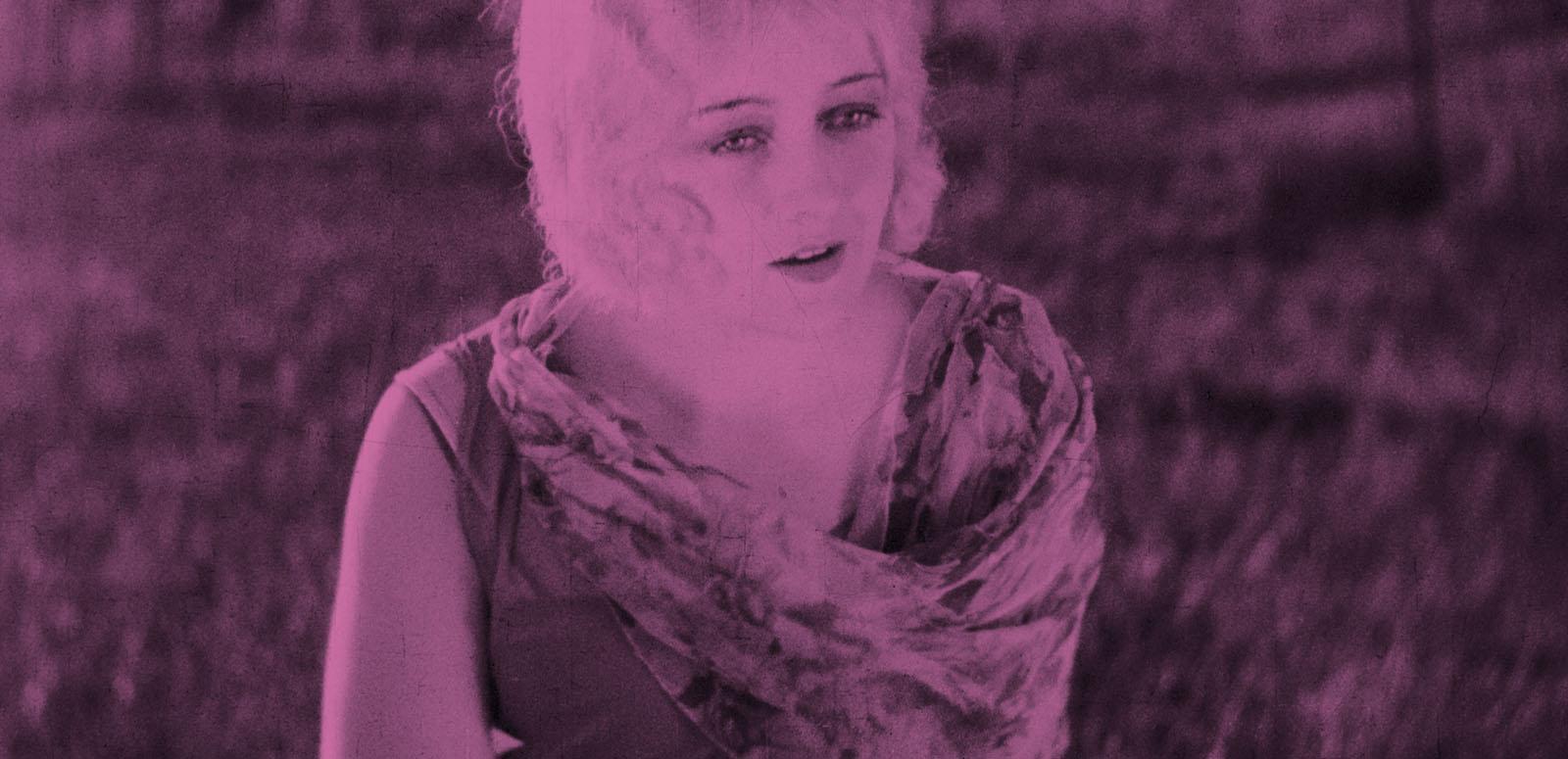 The McDonagh Sisters: A Portrait A rose-pink tinted image of a woman looking off into the distance.
