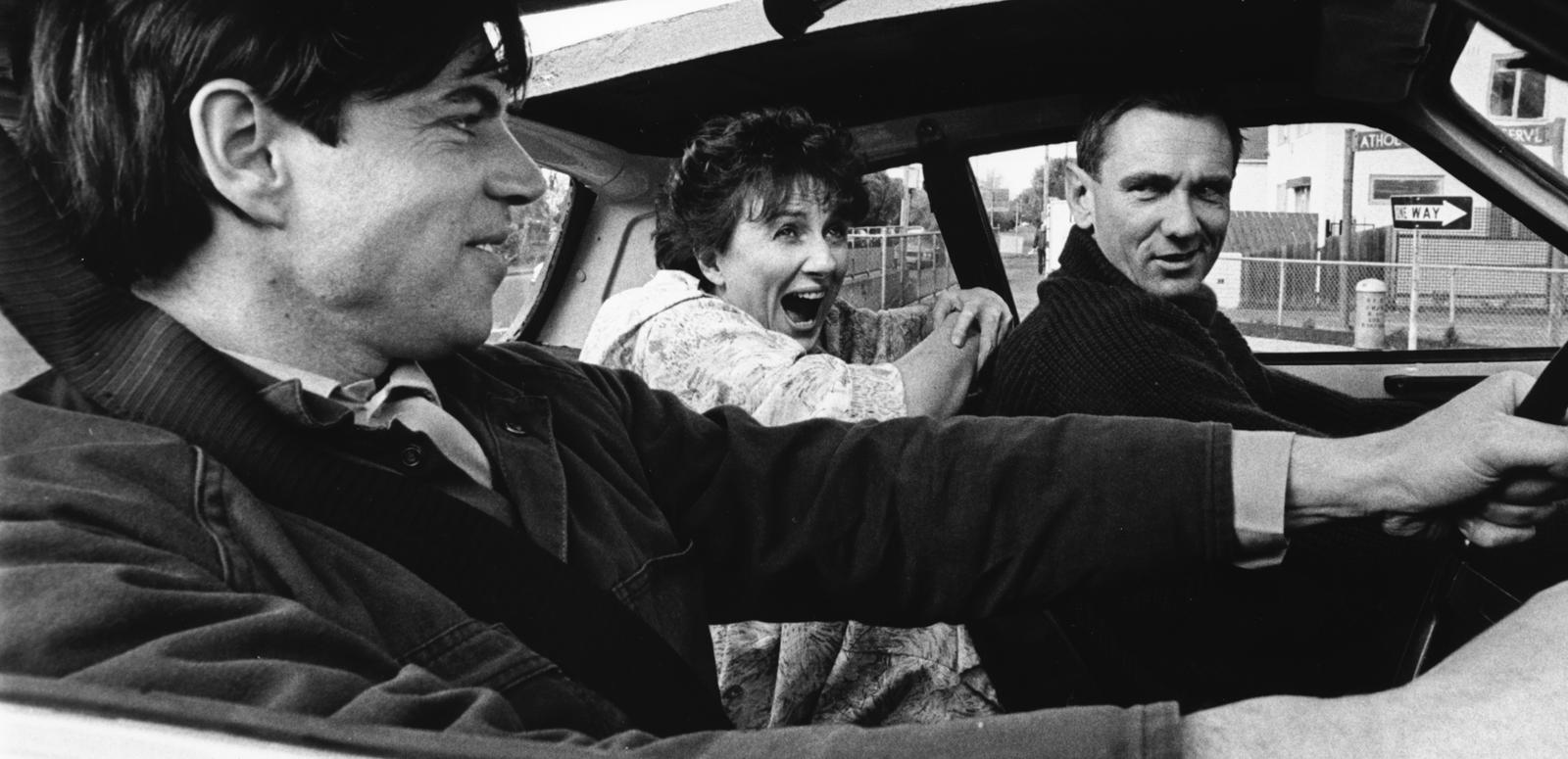Colin Friels as Malcolm demonstrates how his getaway car splits in two.