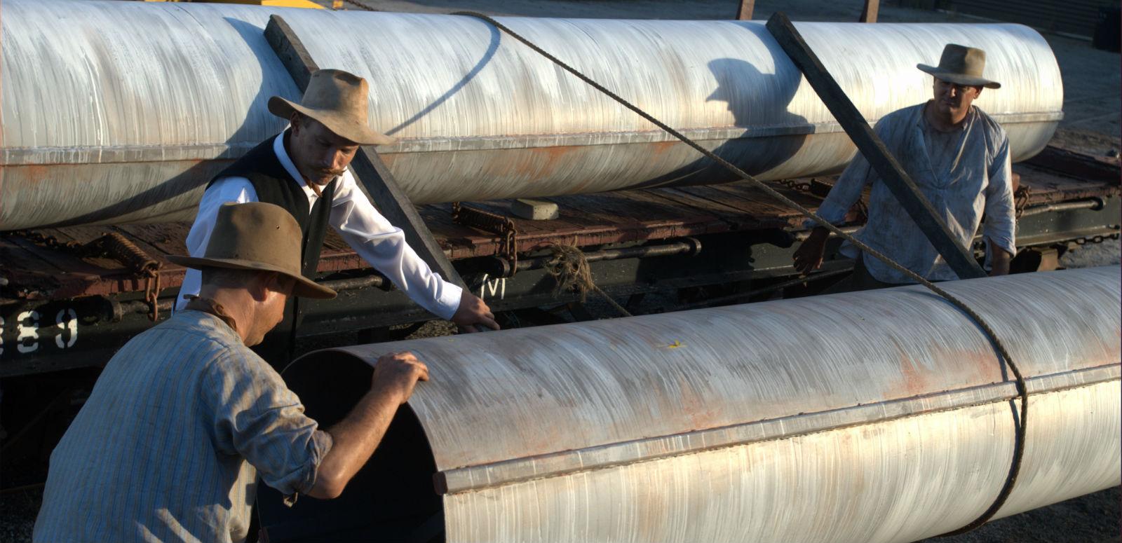 Men working on a large pipeline