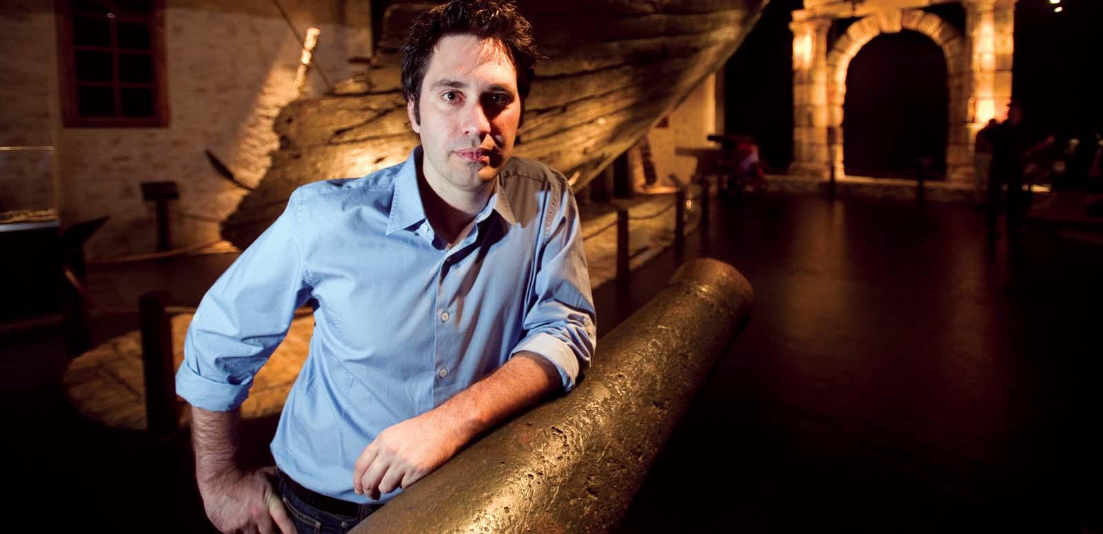 National Treasures host Chris Taylor standing near the wreck of the Batavia ship at the Western Australian Maritime Museum National Treasures host Chris Taylor standing near the wreck of the Batavia ship at the Western Australian Maritime Museum