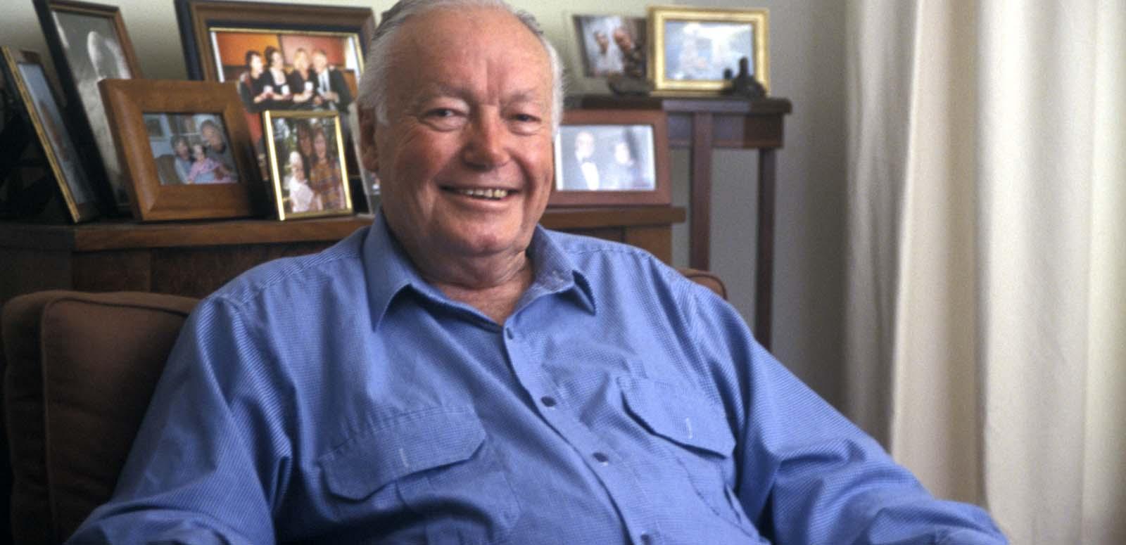Actor Charles 'Bud' Tingwell being interviewed at home