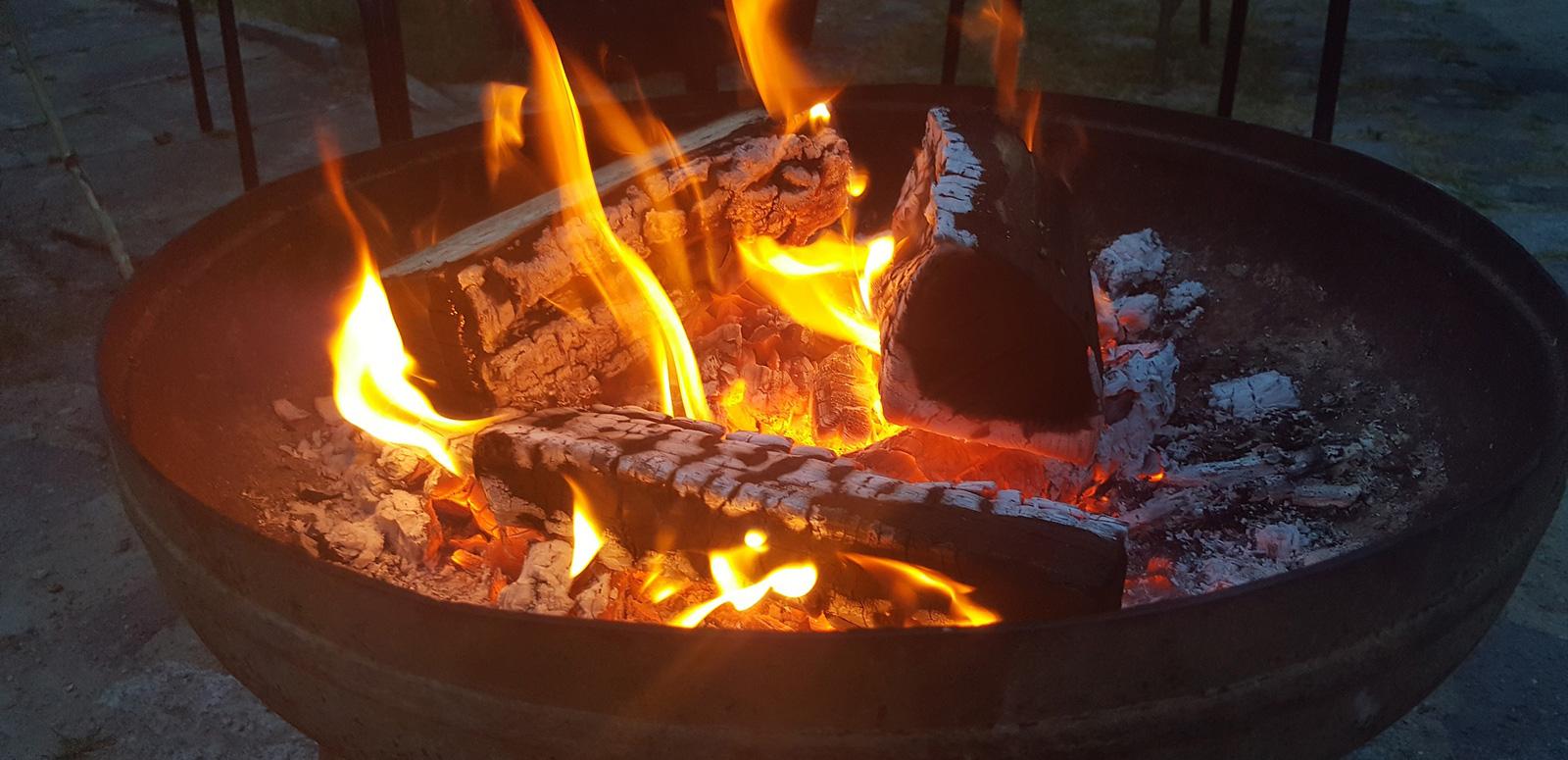 Close up of a round fire pit or kettle barbecue